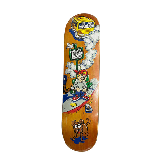 Skateboard deck with cartoon design on a white surface
