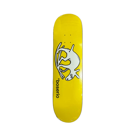 Yellow skateboard deck with a white graphic on a white surface