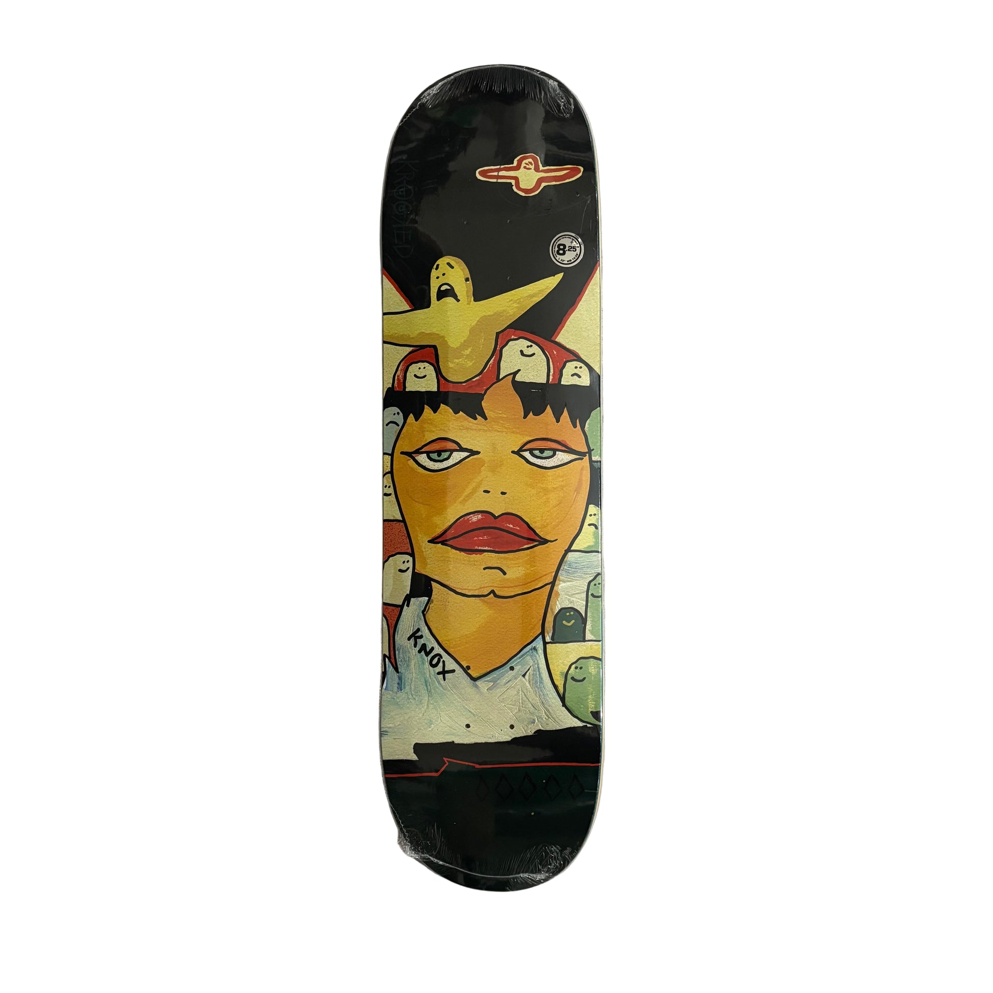 Skateboard deck with artistic design on a white surface