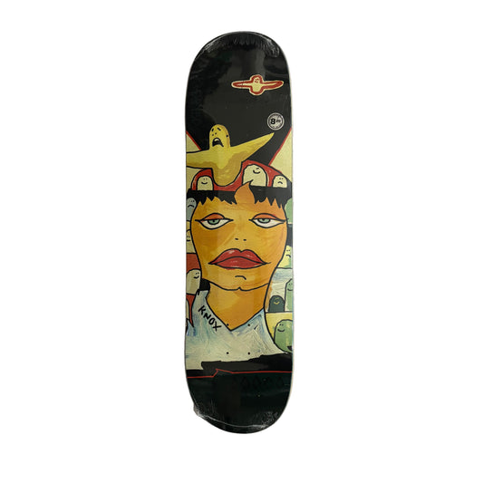 Skateboard deck with artistic design on a white surface