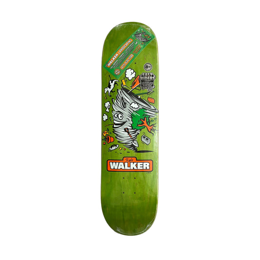 Green skateboard deck with a cartoon character design on a white surface