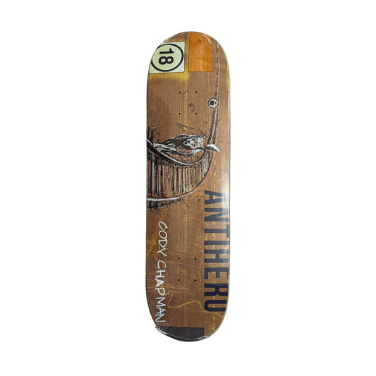 Skateboard deck with artwork and text on a white surface