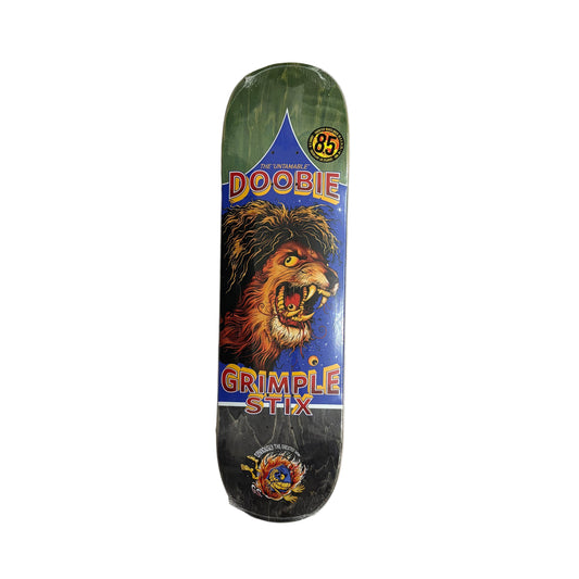 Skateboard deck with a lion graphic and text on a white surface