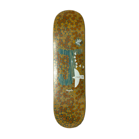 Skateboard deck with a mosaic design on a white surface