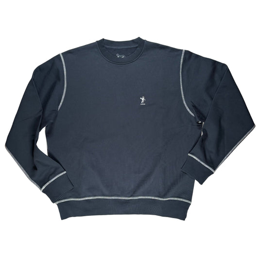 Dark blue sweatshirt with a small logo on a white surface