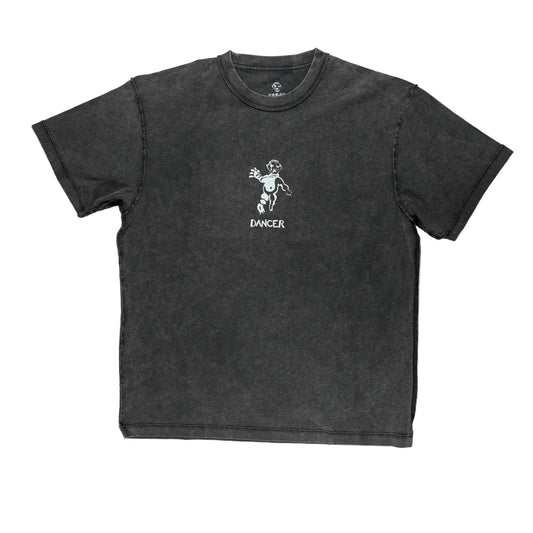 Black washed style t-shirt with a graphic design on a white surface
