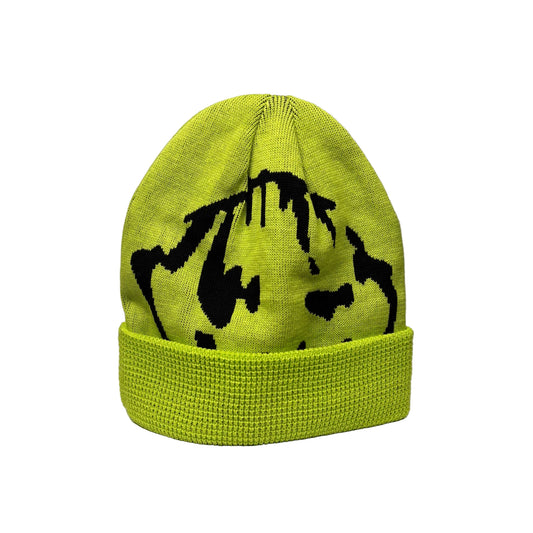 Green knit beanie with black abstract design on a white background