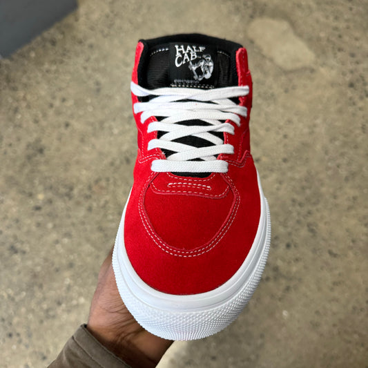top down view of red suede and canvas skateboard shoe