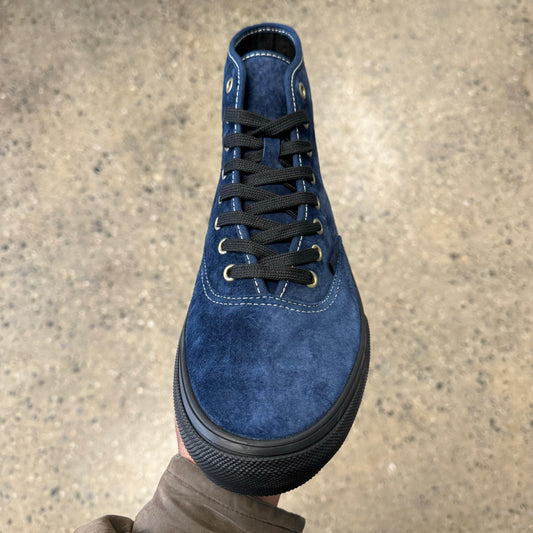 Top down view of navy suede skateboard shoe, laces, and toe box