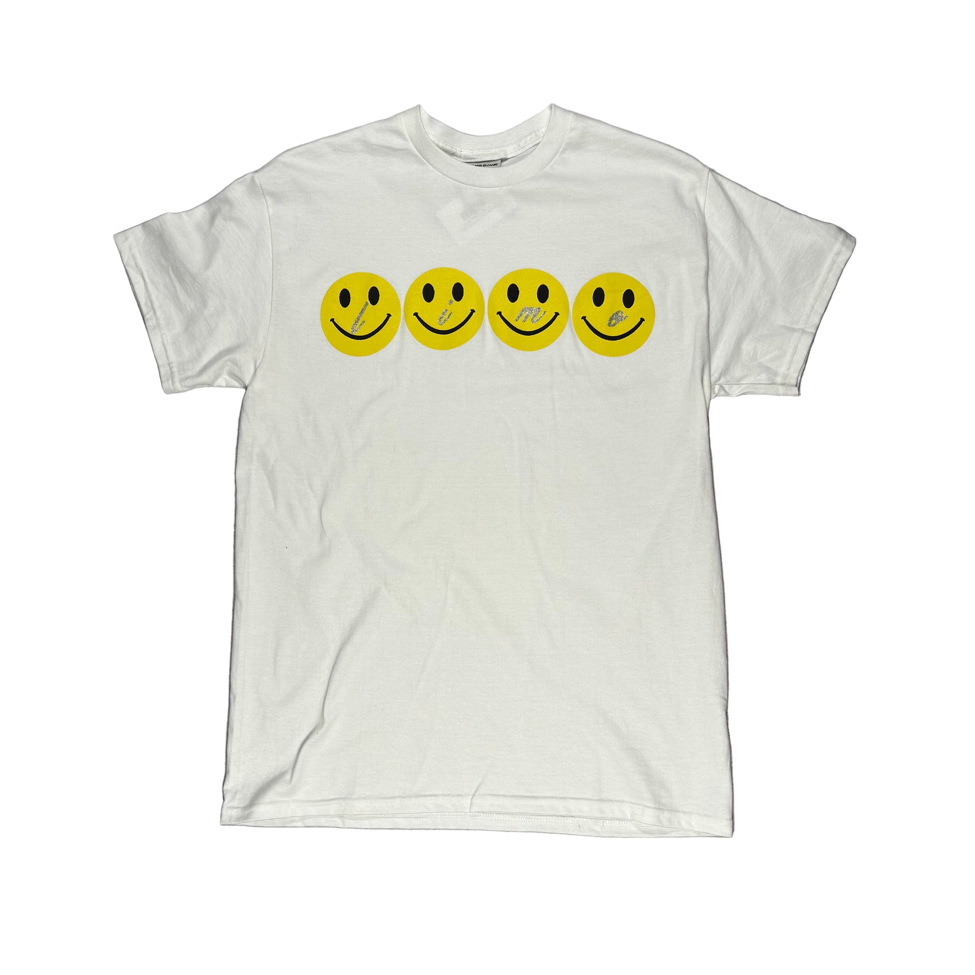 White t-shirt with yellow smiley face graphics on a white surface