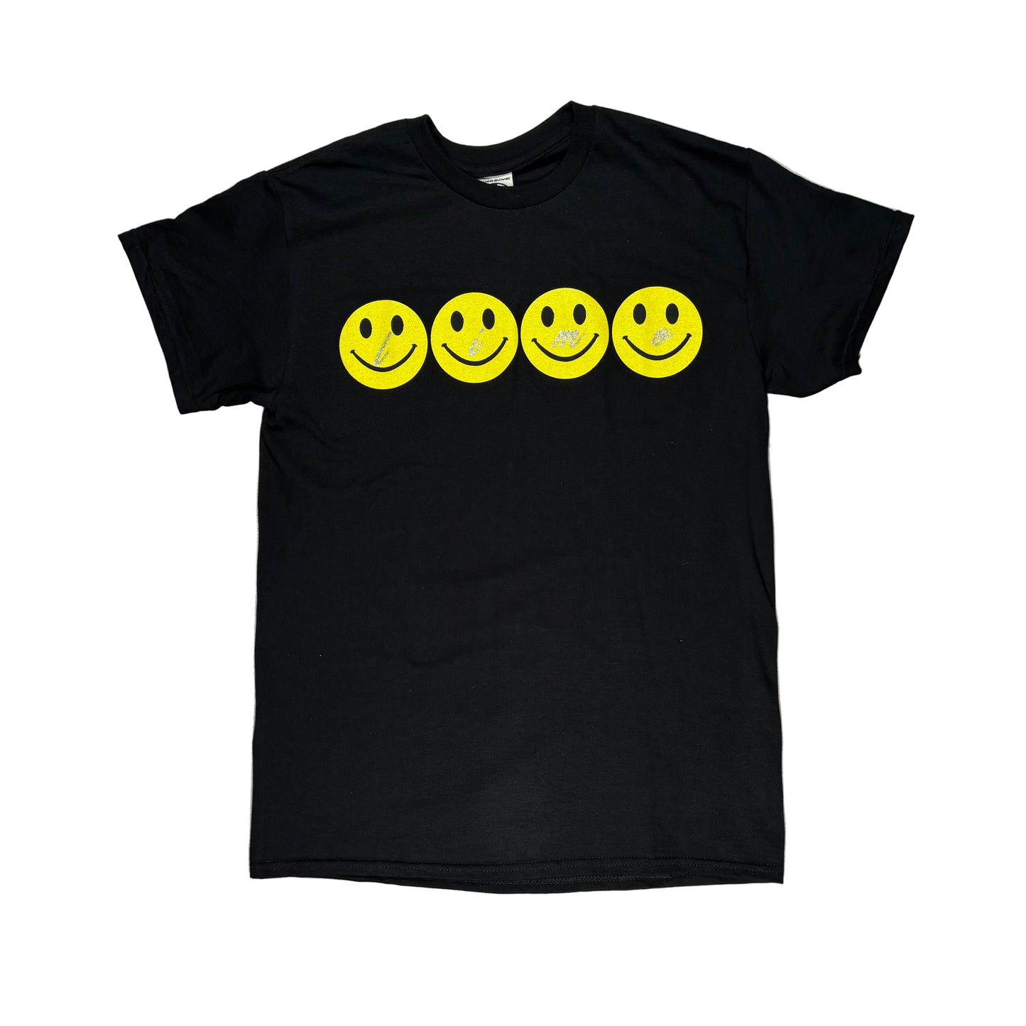 Black t-shirt with yellow smiley face graphics on a white  surface