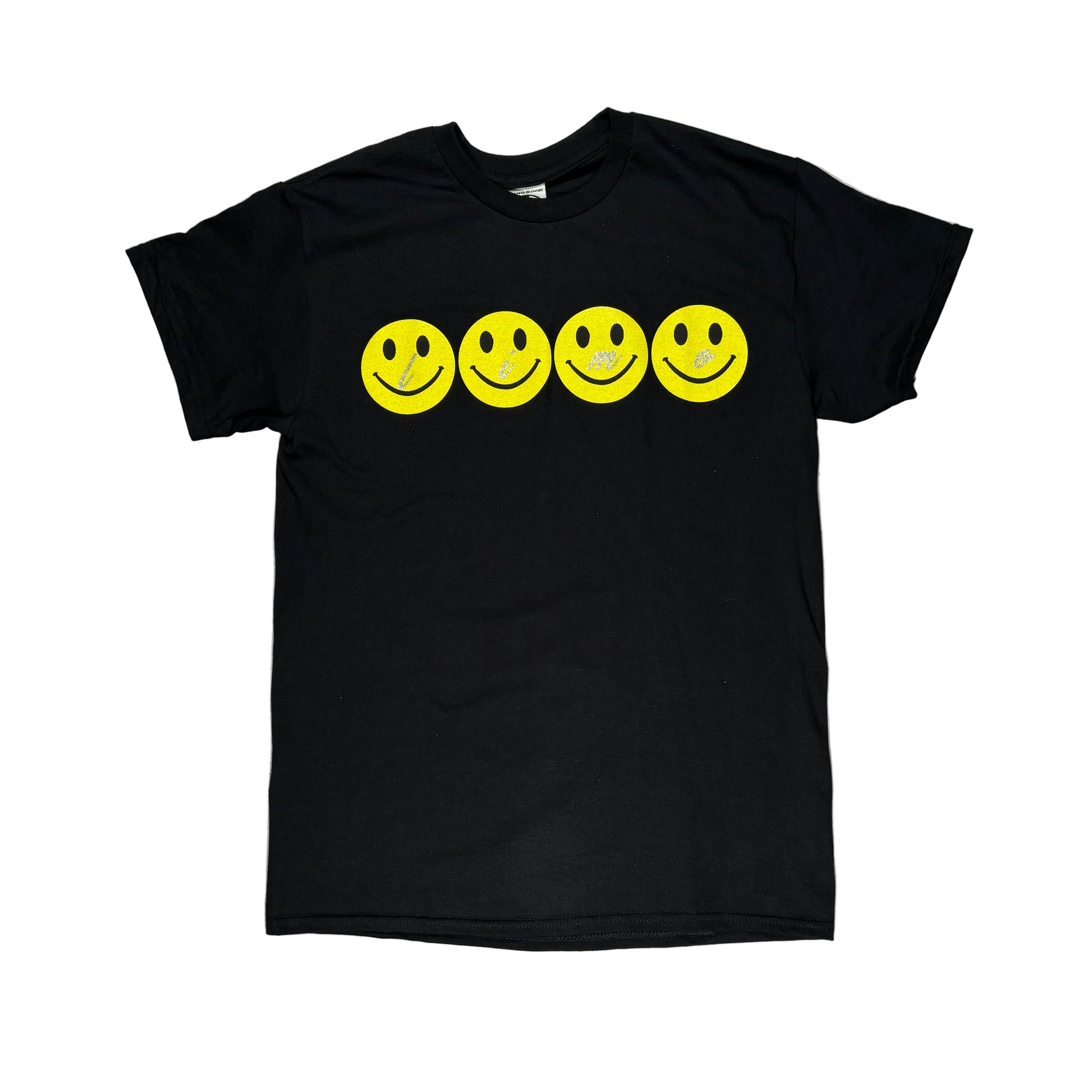 Black t-shirt with yellow smiley face graphics on a white  surface