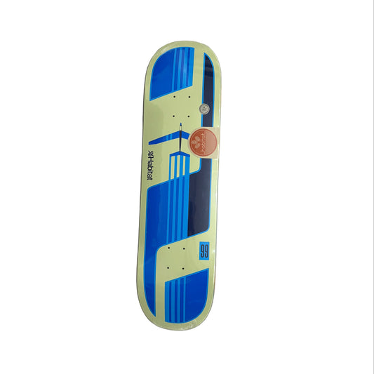 Skateboard deck with blue and beige airplane design on a white surface