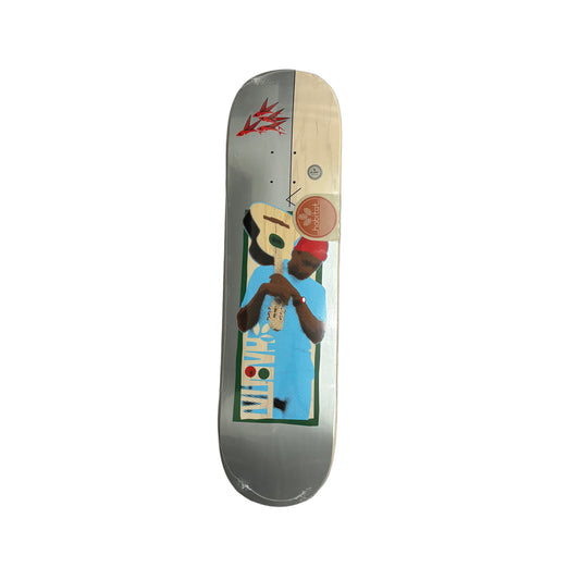 Skateboard deck with colorful graphics on a white surface