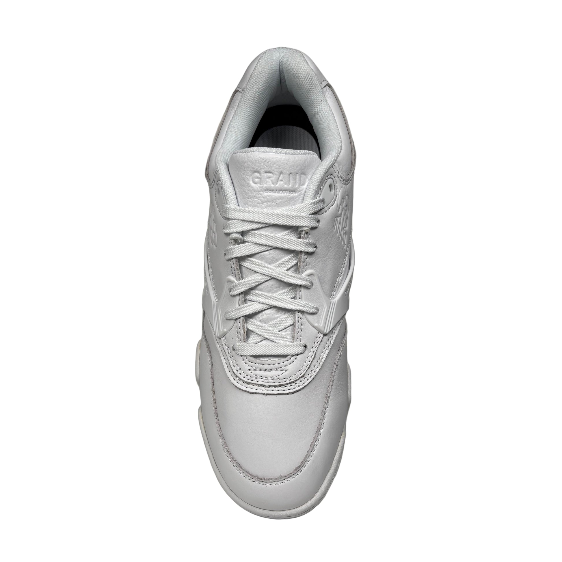 top down view of White sneaker on a white background