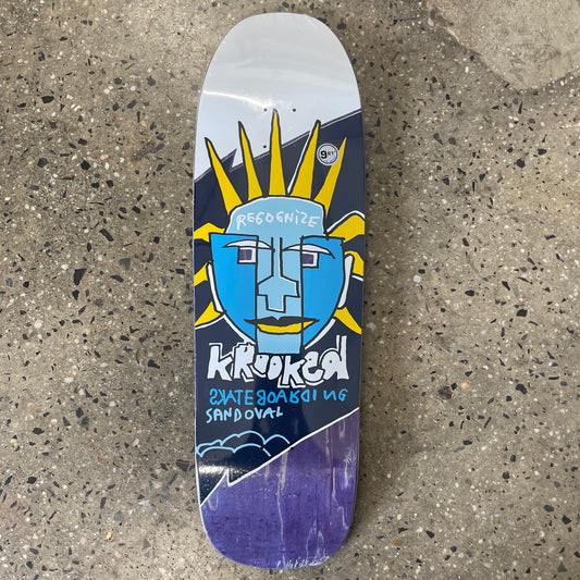 yellow and blue abstract face on skate deck