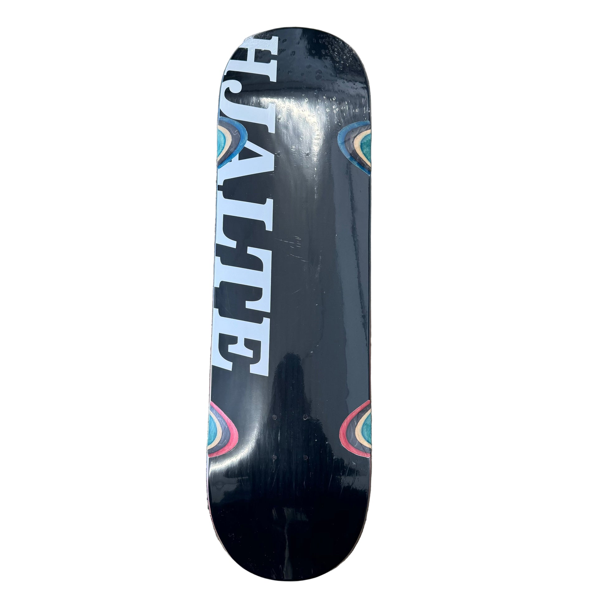 white text and rainbow detail on black skate deck