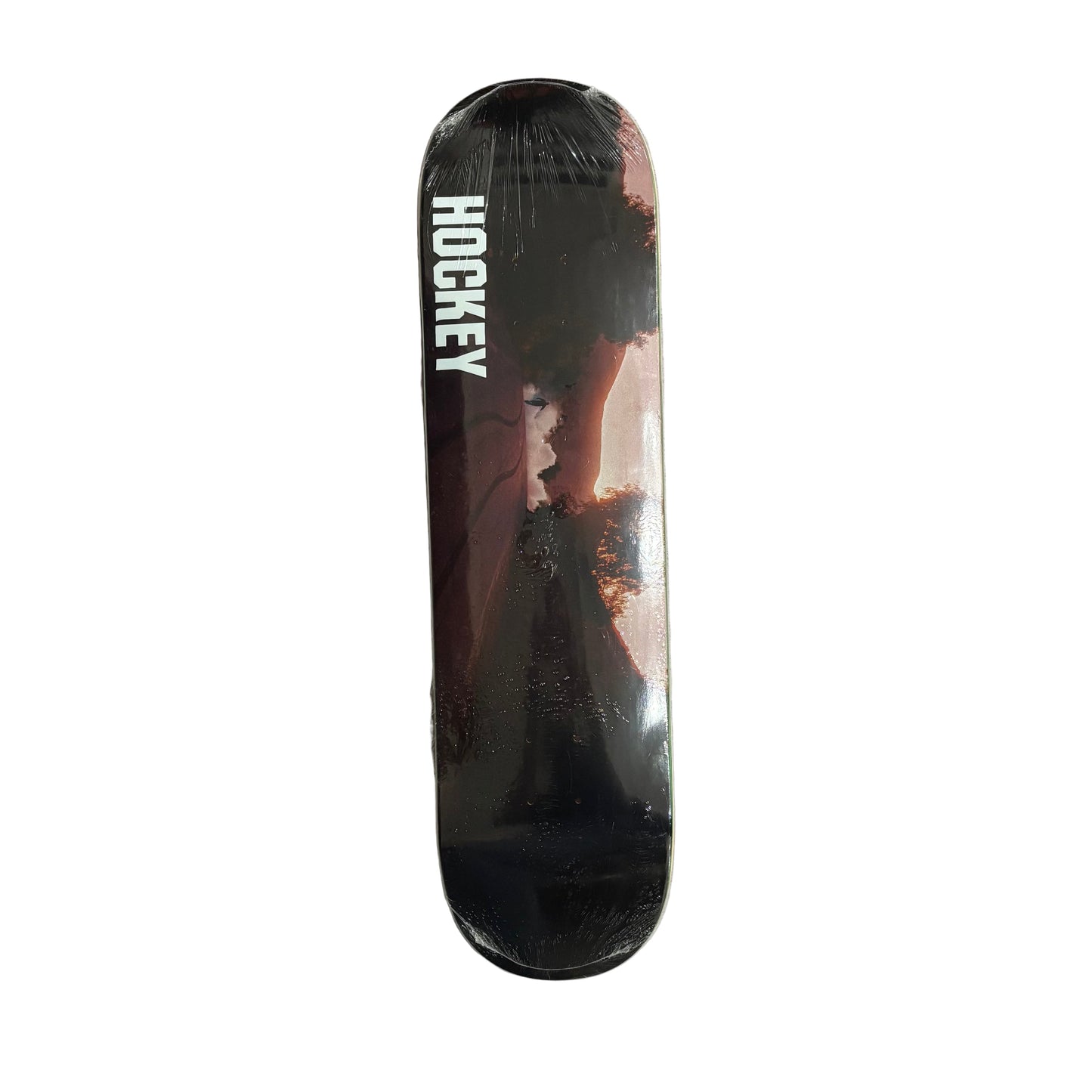 Skateboard deck with 'Hockey' branding on a white surface