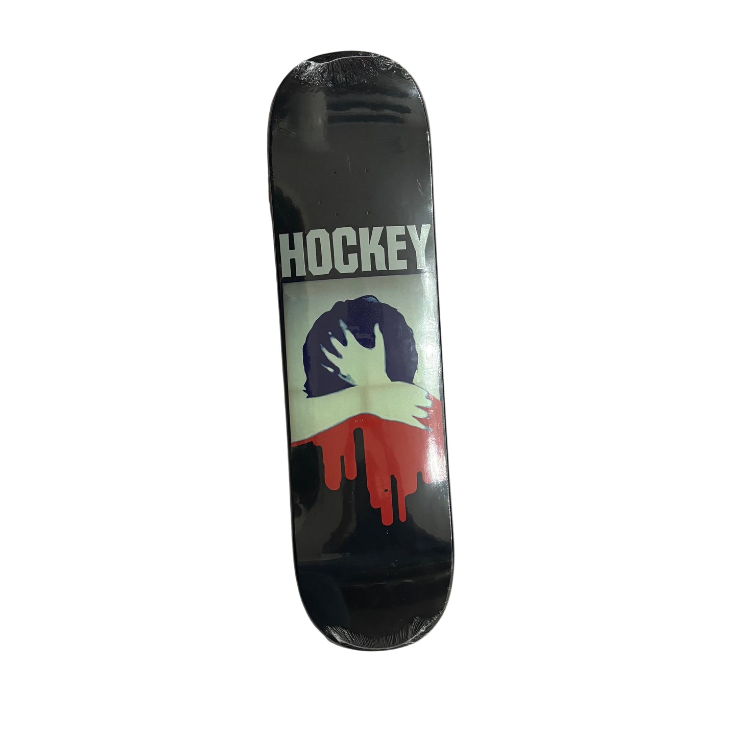 Skateboard deck with 'Hockey' logo and colorful design on a white surface.