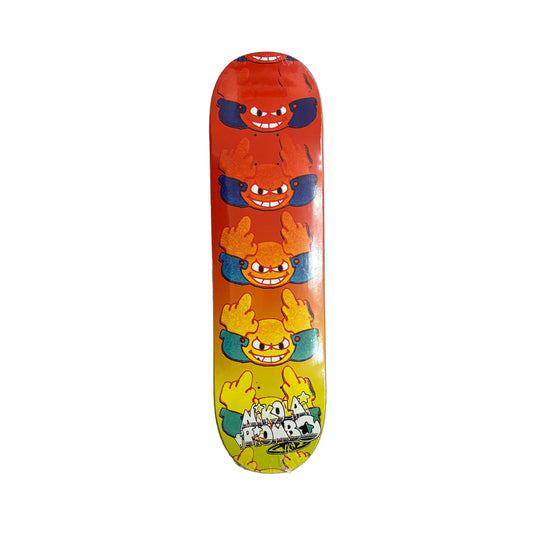 Colorful skateboard deck with cartoon character design on a white surface.
