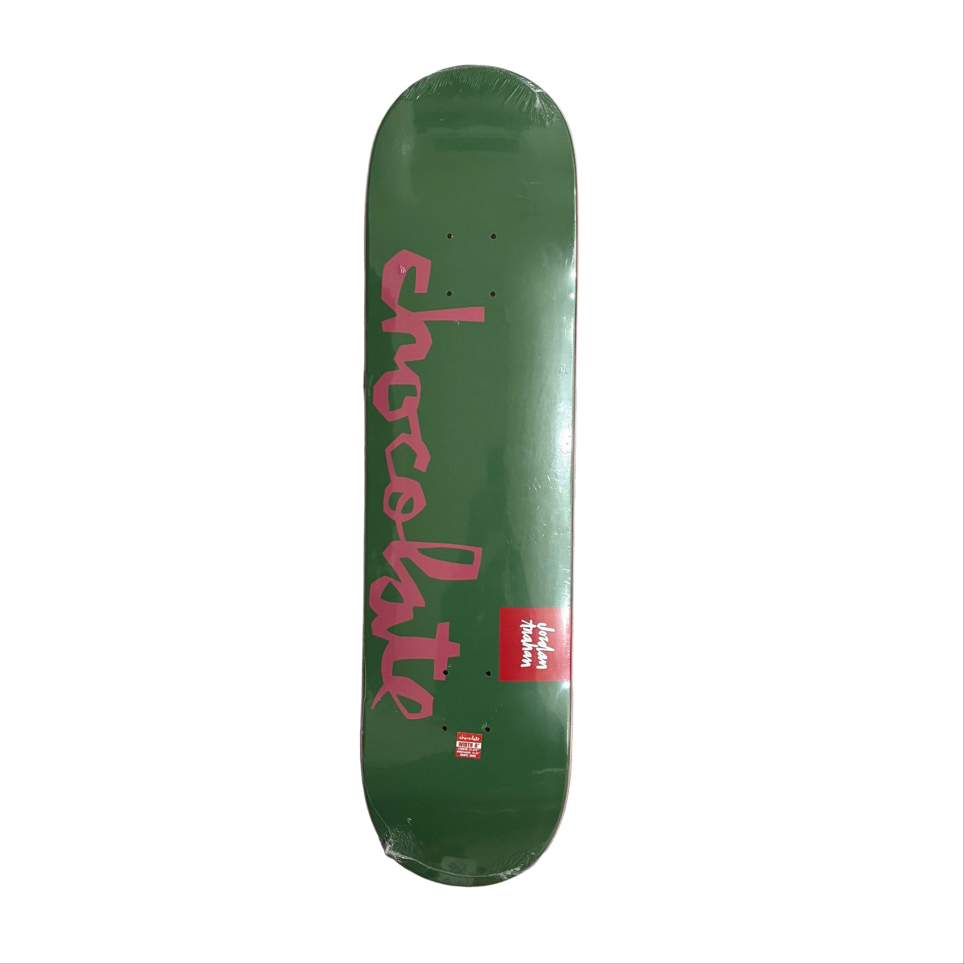 Green skateboard deck with 'Chocolate' logo on a white surface