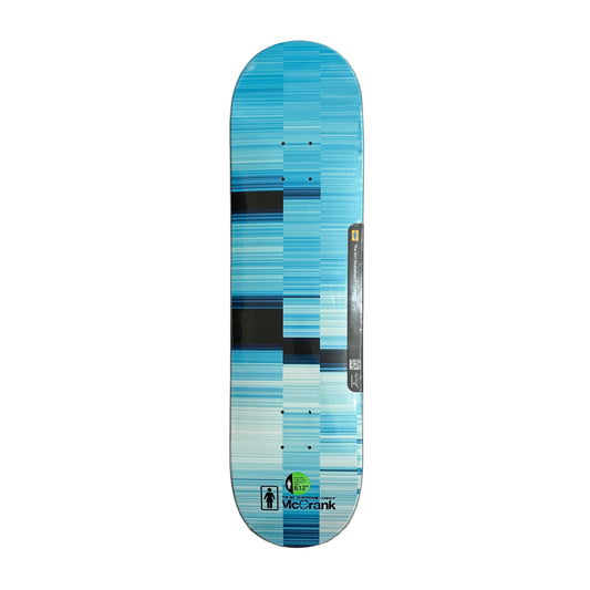 Skateboard deck with blue and gray pattern on a white surface