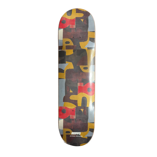 Skateboard deck with abstract design on a white surface