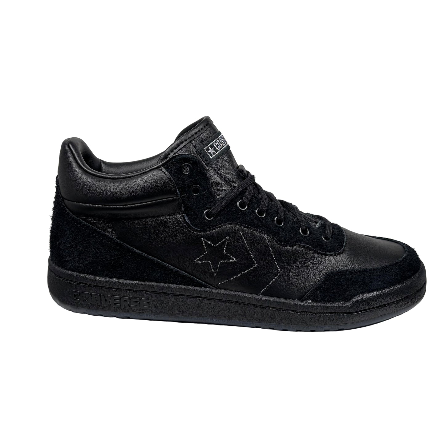 Black sneaker with a star logo on a white background