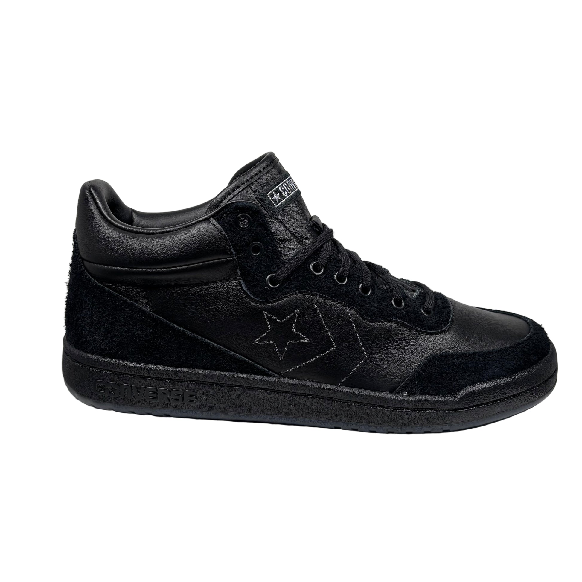 Black sneaker with a star logo on a white background