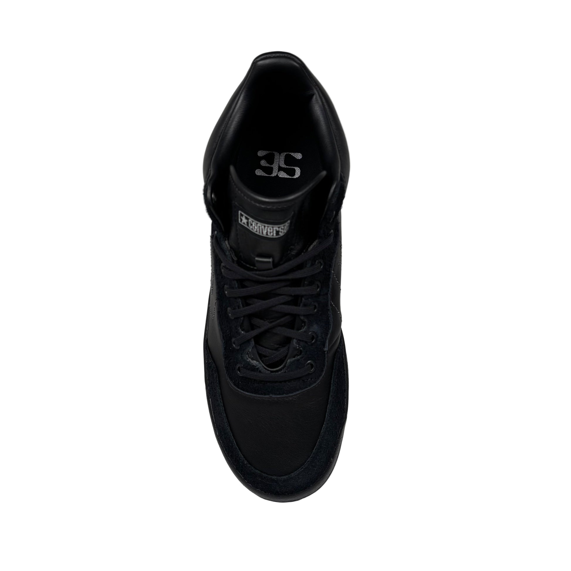 top down view of Black sneaker on a white background
