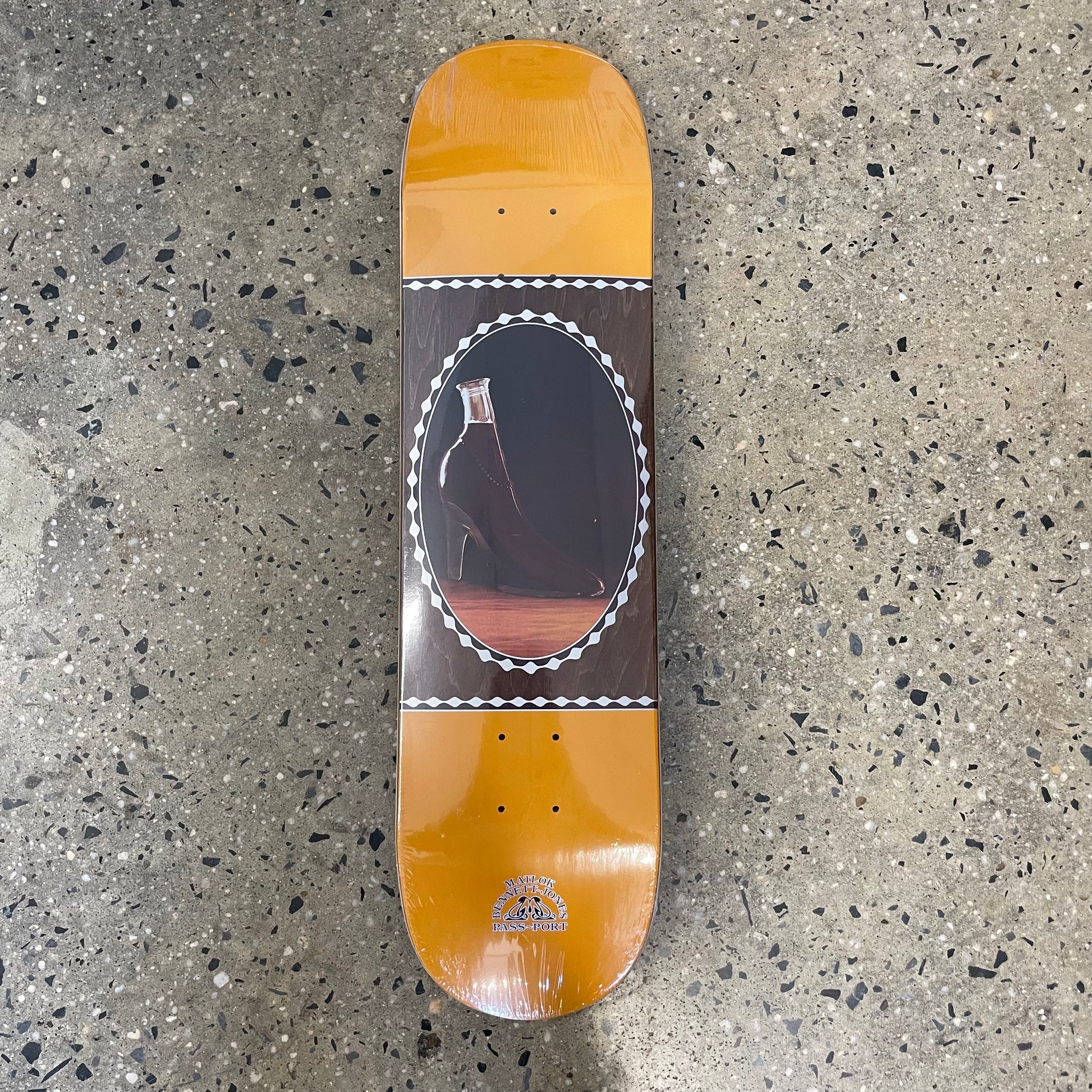 abstract design on yellow skate deck