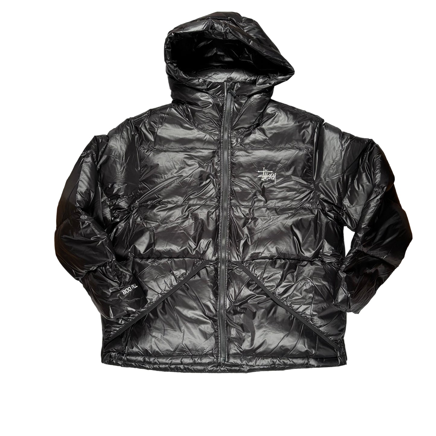 Black puffer jacket on a white background
