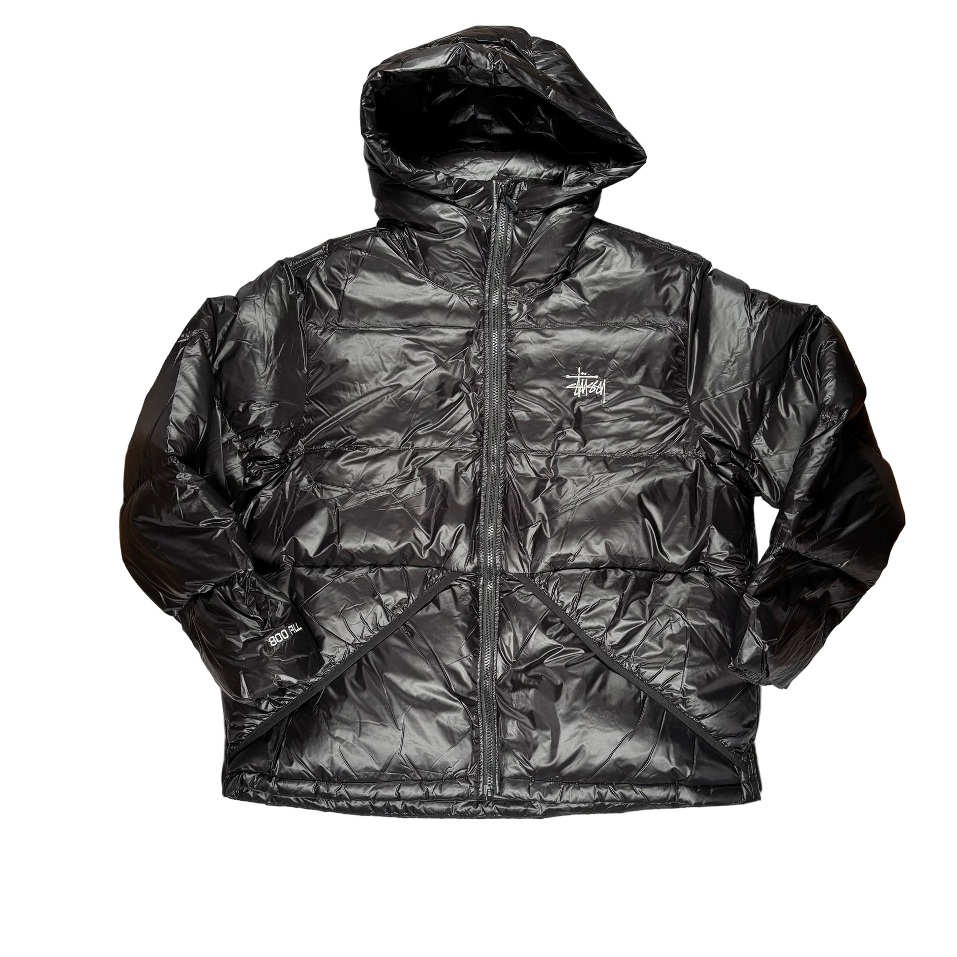 Black puffer jacket on a white background