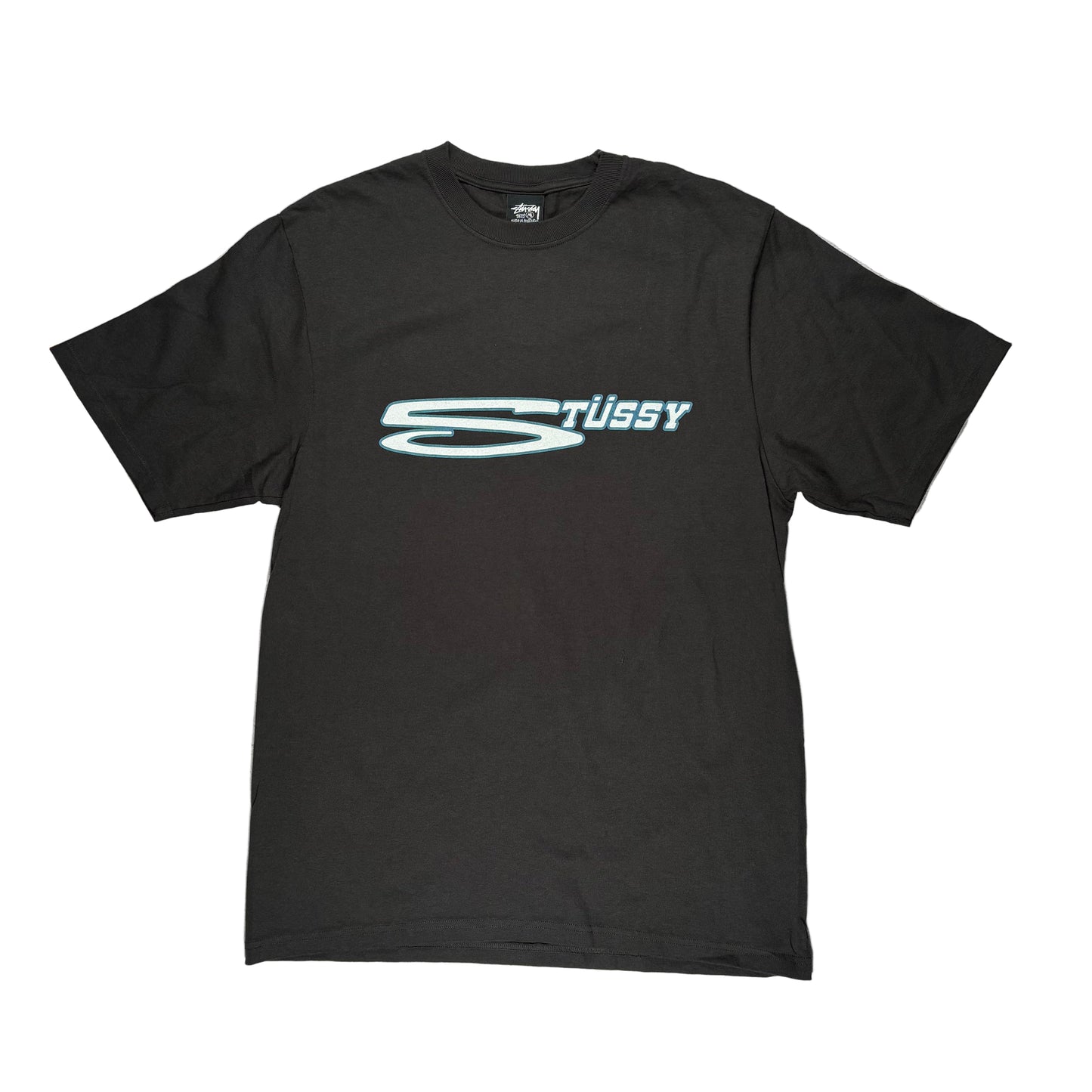 Black t-shirt with Stussy logo on a white surface