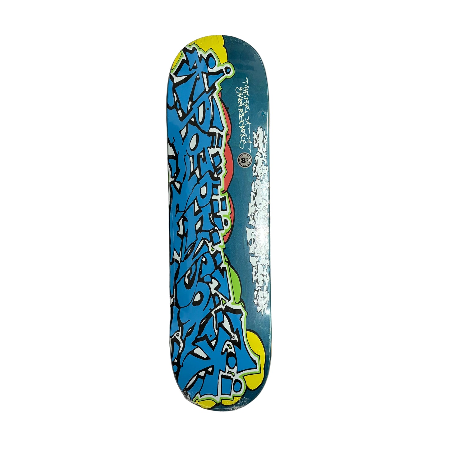 Skateboard deck with colorful graffiti design on a white surface