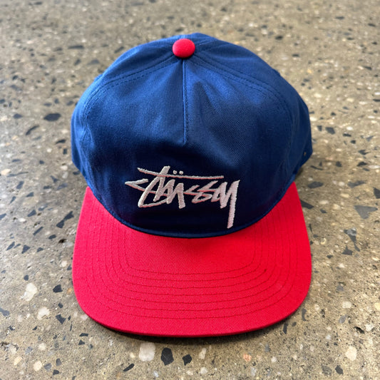 red and blue stusst logo cap