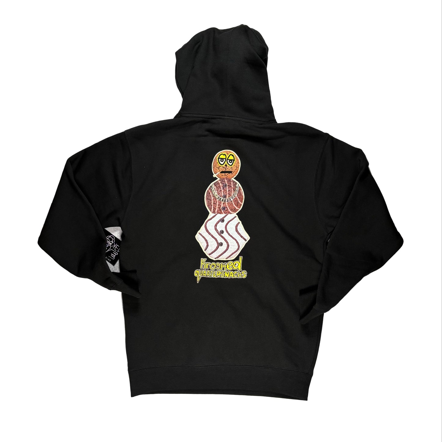 Black hoodie with a unique design on the back, displayed on a white surface.