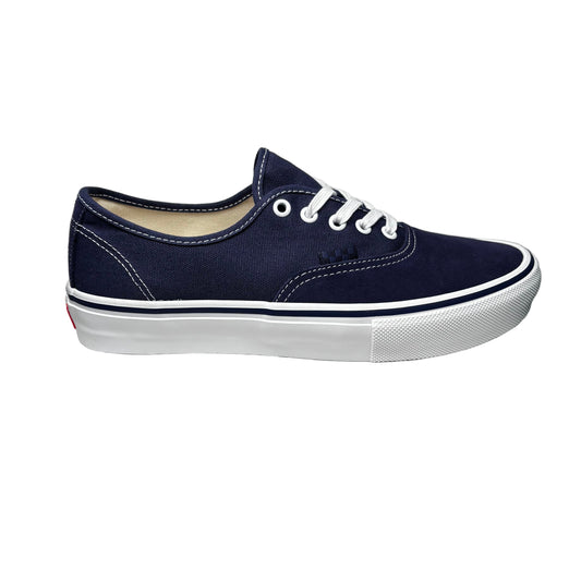 Navy blue sneaker with white laces on a white background