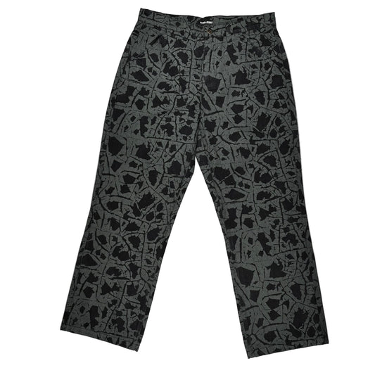 Black patterned pants on a white  background