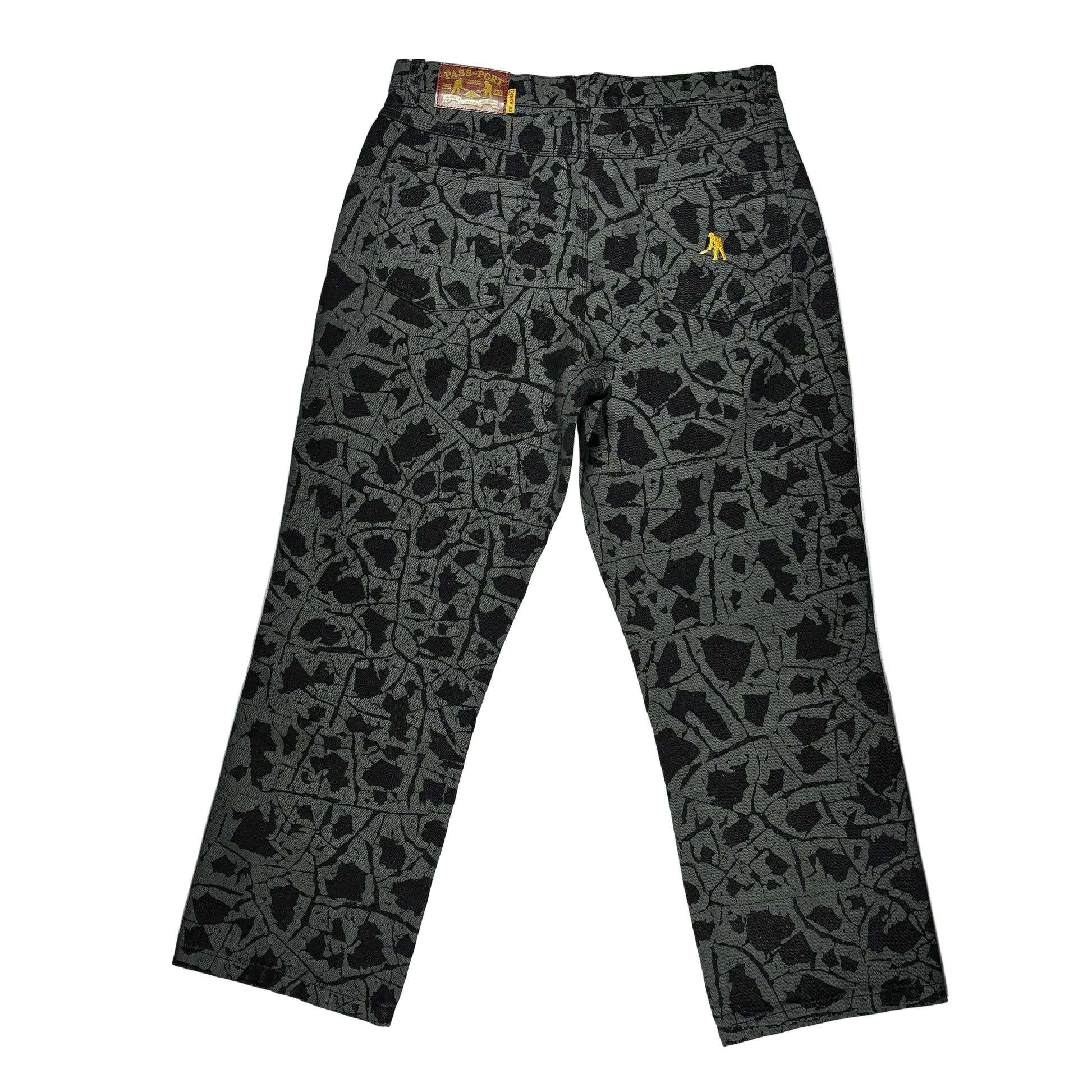 Black patterned pants on a white background