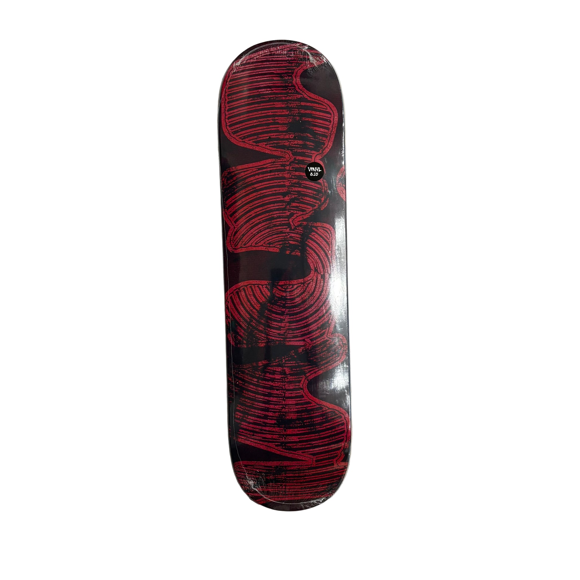 Skateboard deck with red and black design on a white surface