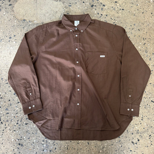 brown long sleeve shirt with white buttons
