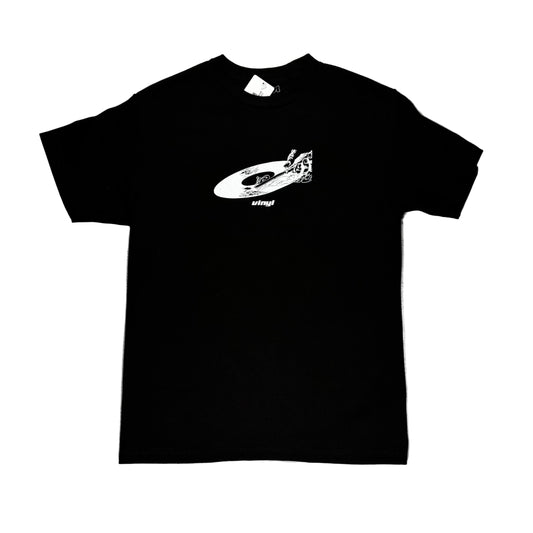 Black t-shirt with a white graphic design on a white surface