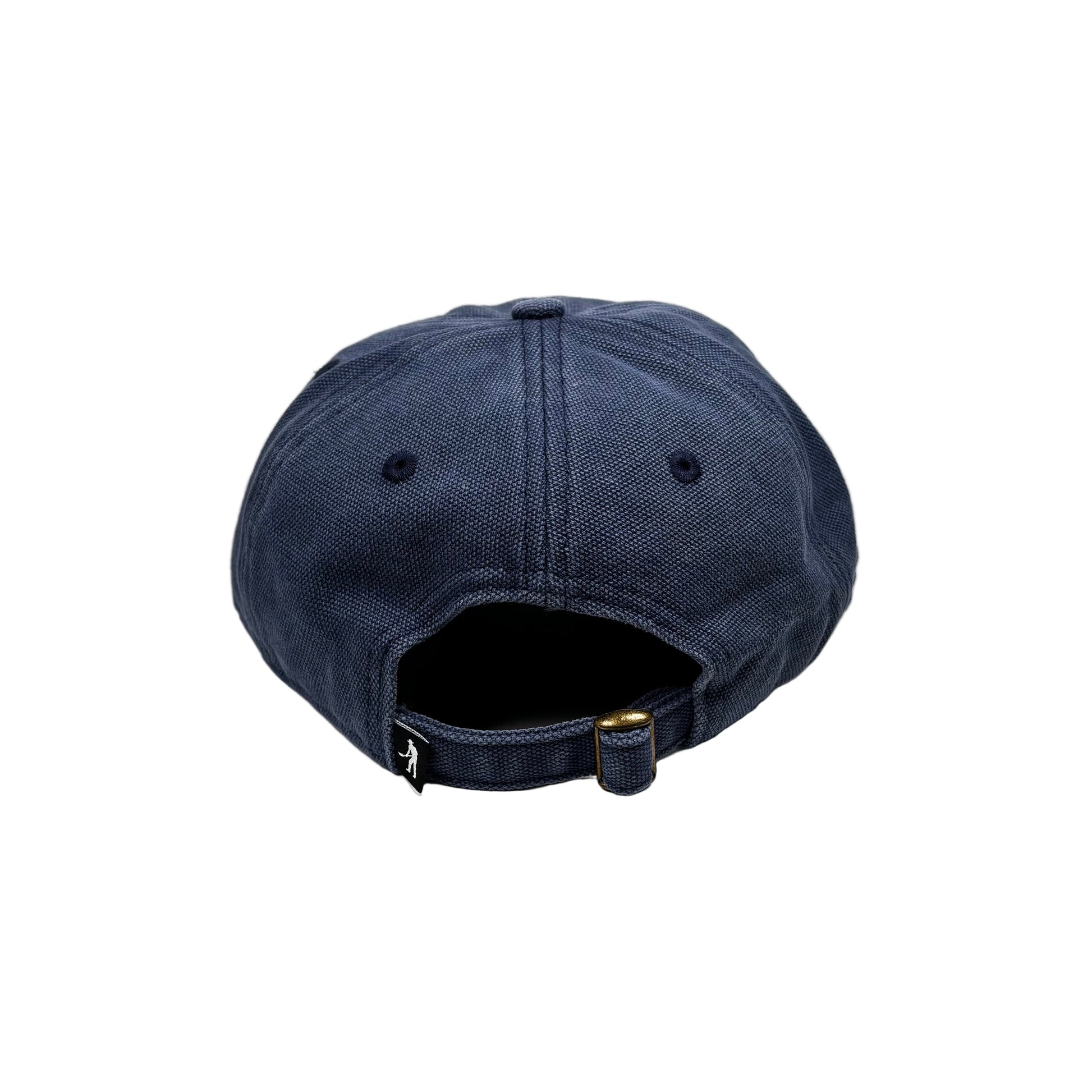 Navy blue cap on a white pedestal against a white background