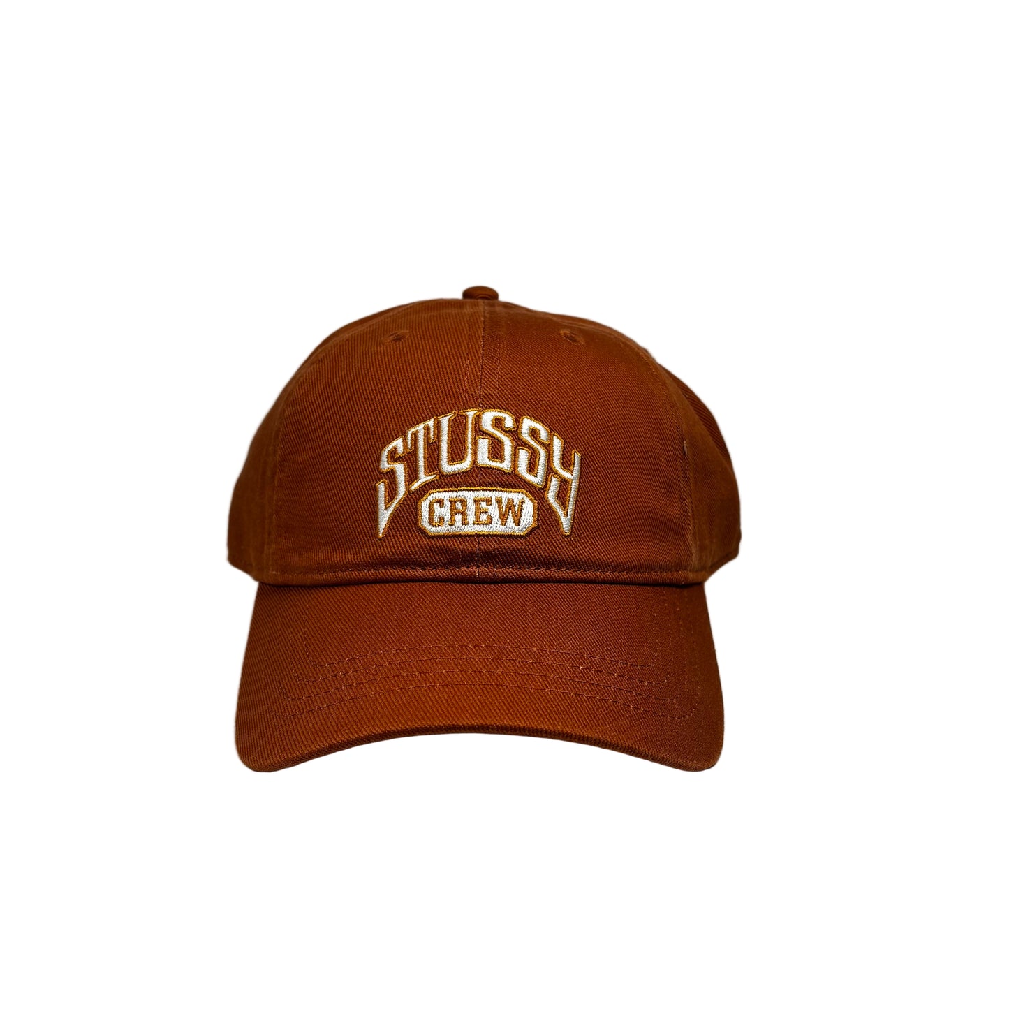 Brown cap with 'Stussy Crew' text on a white background