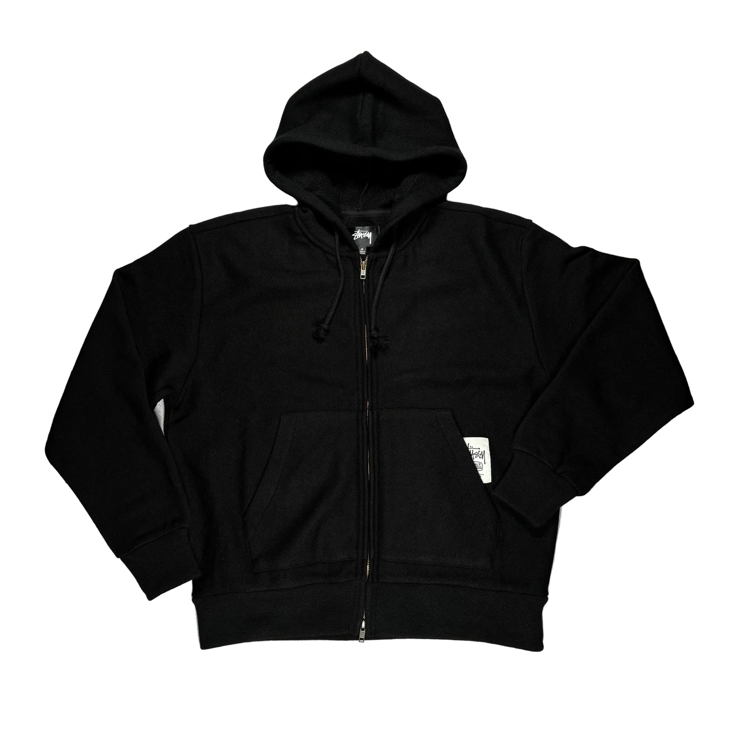 Black hoodie on a white surface