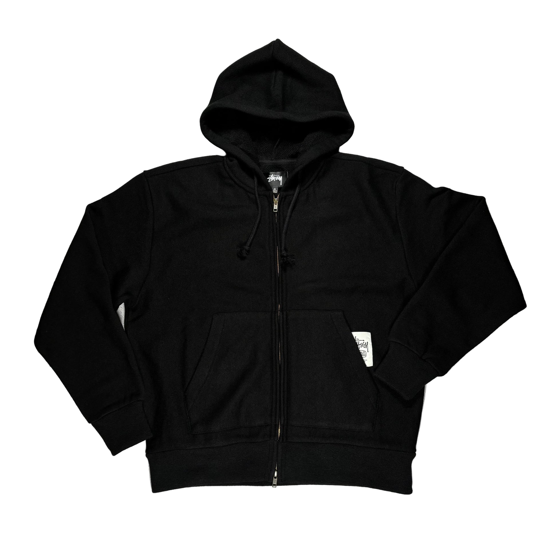 Black hoodie on a white surface