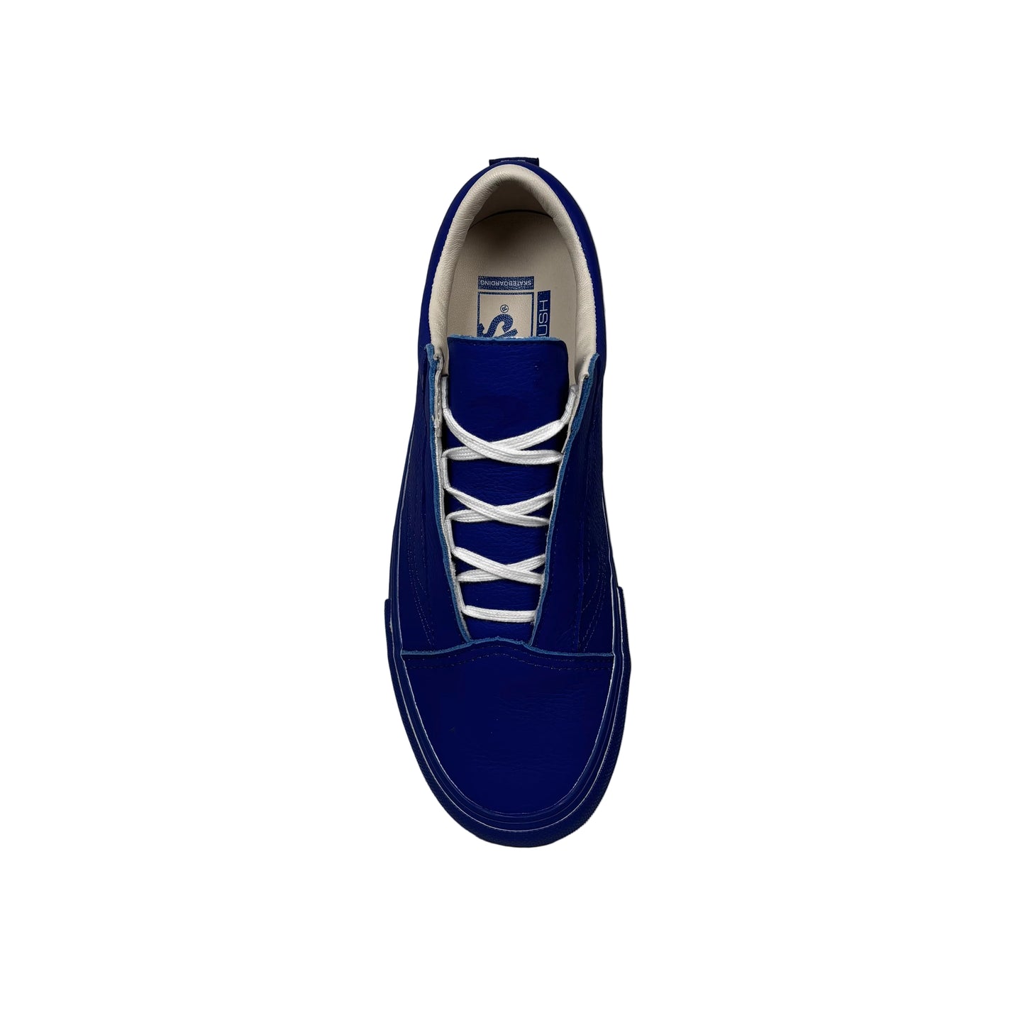 Blue sneaker with white laces on a white background
