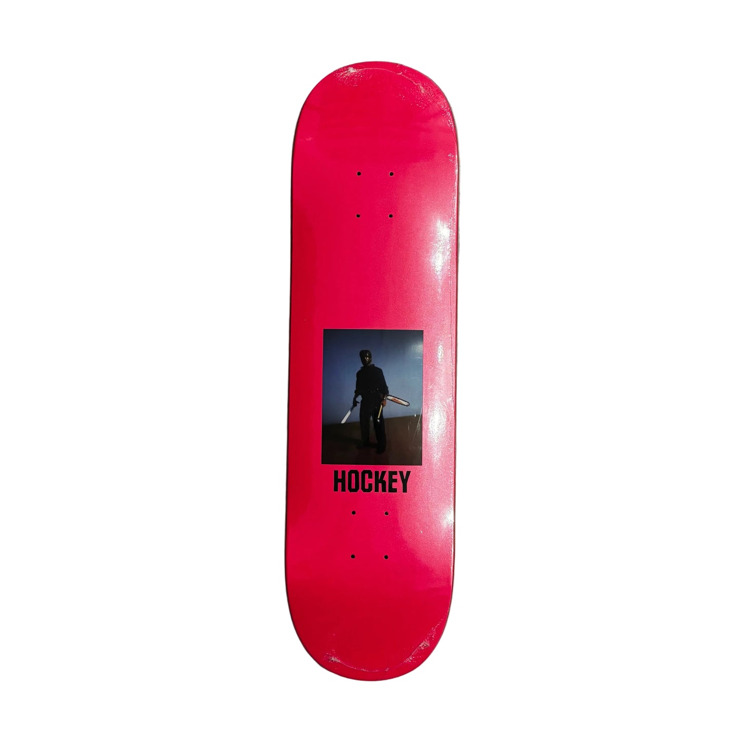 pink skateboard deck with a black graphic and 'Hockey' branding on a white surface.