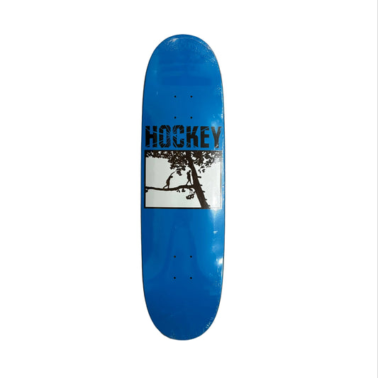 Blue skateboard deck with 'Hockey' logo on a white surface
